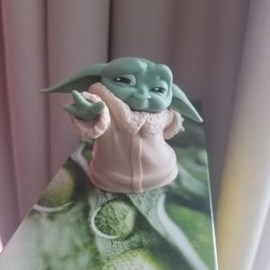 2 styles of Baby Yoda Figurines